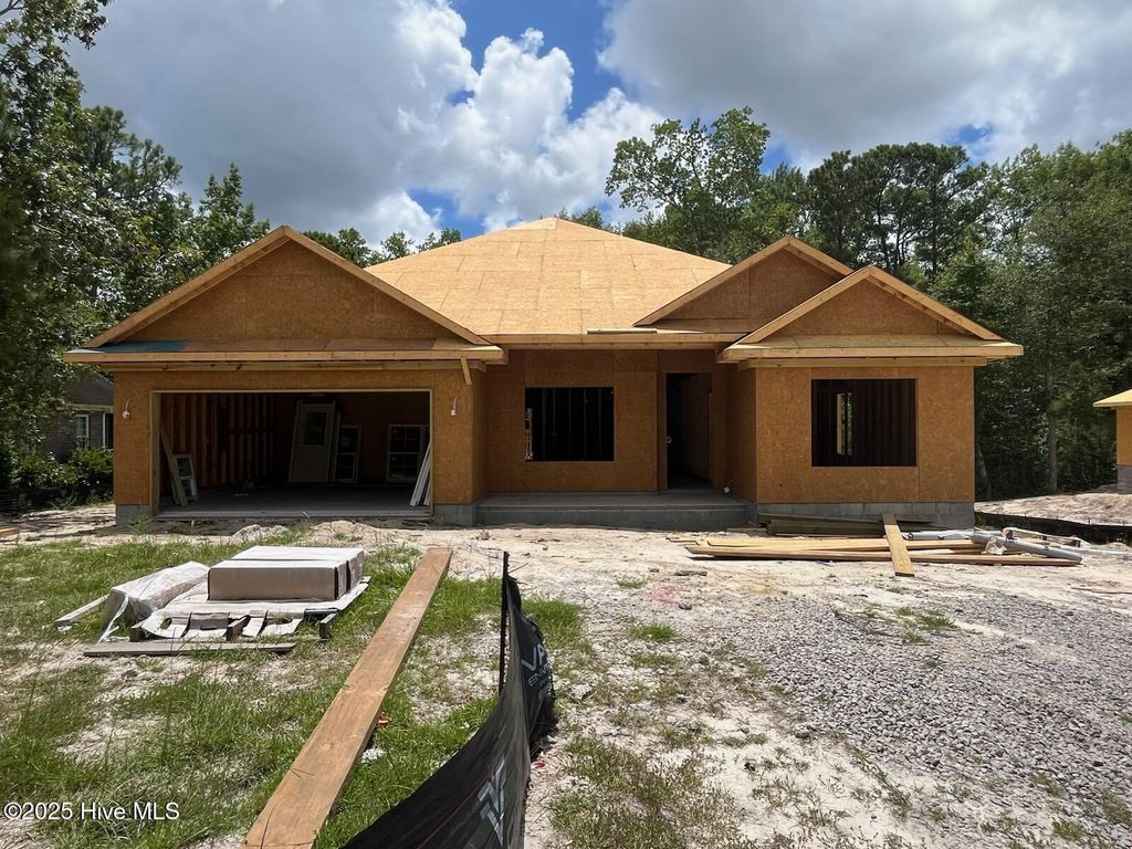 Photo of 1219 St Simons Drive SE, Bolivia, NC 28422 (MLS # 100457591)