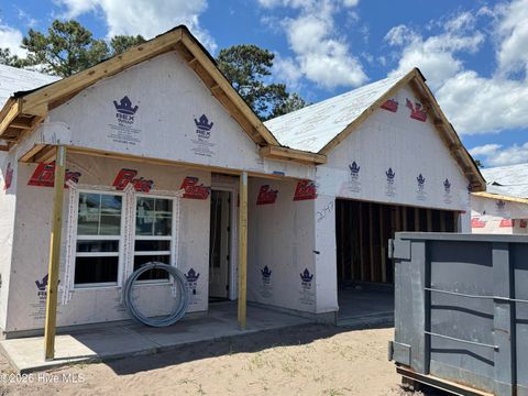 Photo of 2047 Greenside Manor Drive SW, Ocean Isle Beach, NC 28469 (MLS # 100568943)