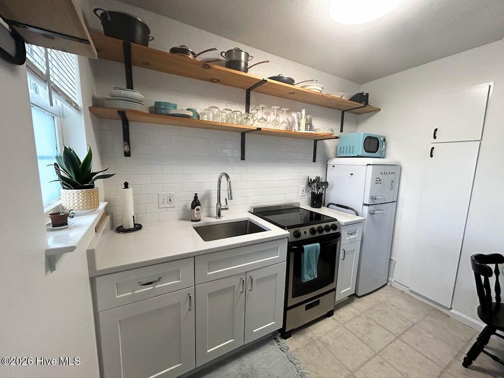 Photo of 300 Spencer Farlow Drive #A, Carolina Beach, NC 28428 (MLS # 100573925)