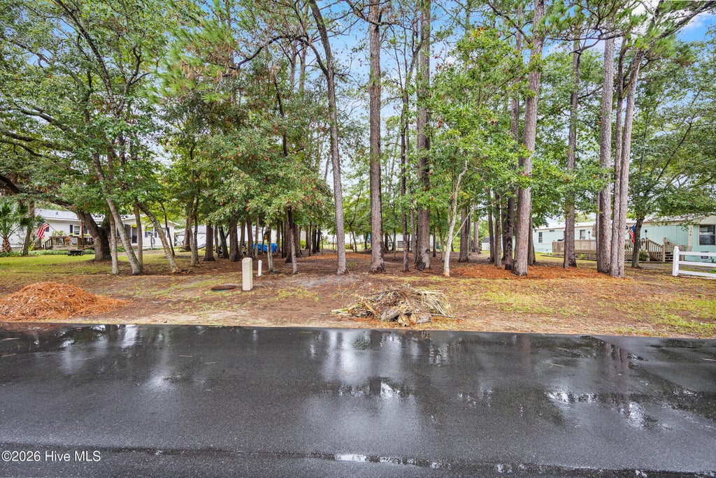 Photo of 1314 NE 68th Street, Oak Island, NC 28465 (MLS # 100605677)