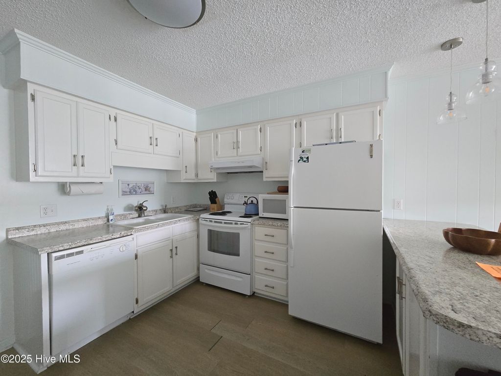 Photo of 301 Commerce Way Way E #104, Atlantic Beach, NC 28512 (MLS # 100391100)