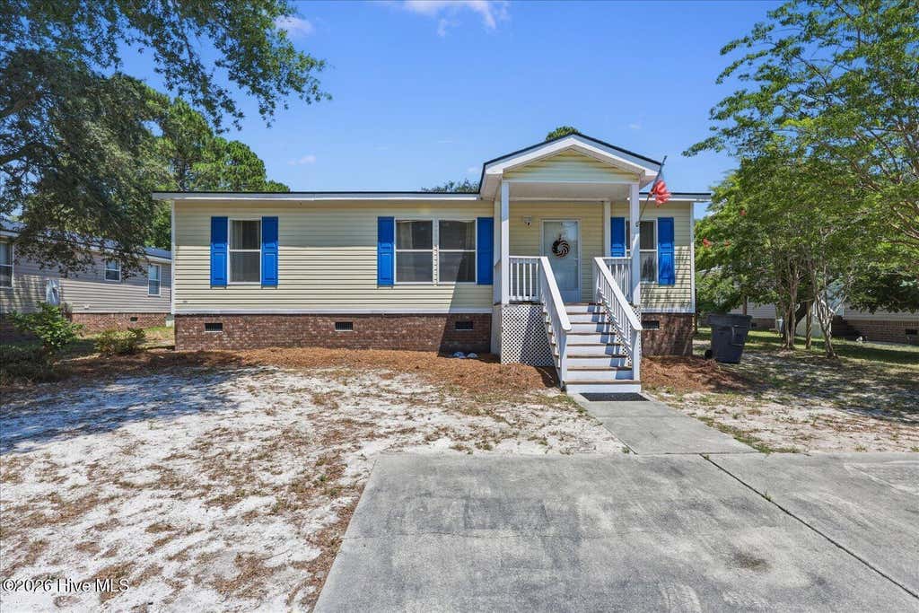 Photo of 703 Dogwood Drive, Sunset Beach, NC 28468 (MLS # 100588143)