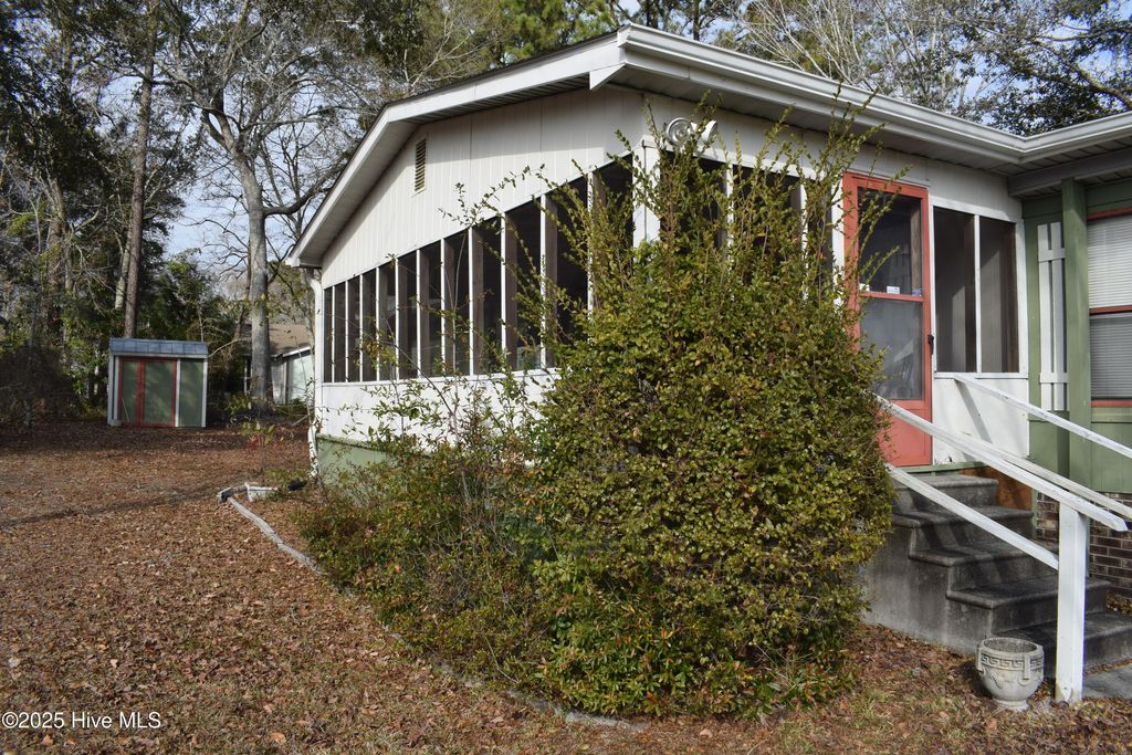 Photo of 821 Magnolia Drive, Sunset Beach, NC 28468 (MLS # 100560485)