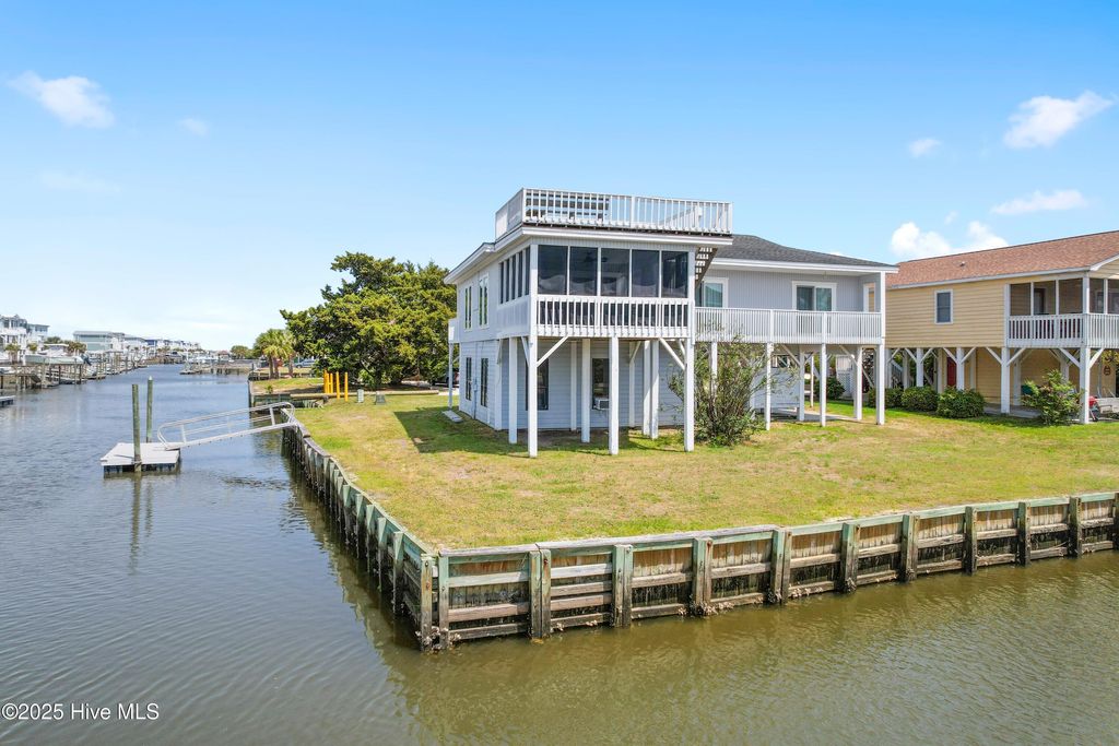 Photo of 402 Dolphin Street, Sunset Beach, NC 28468 (MLS # 100503570)