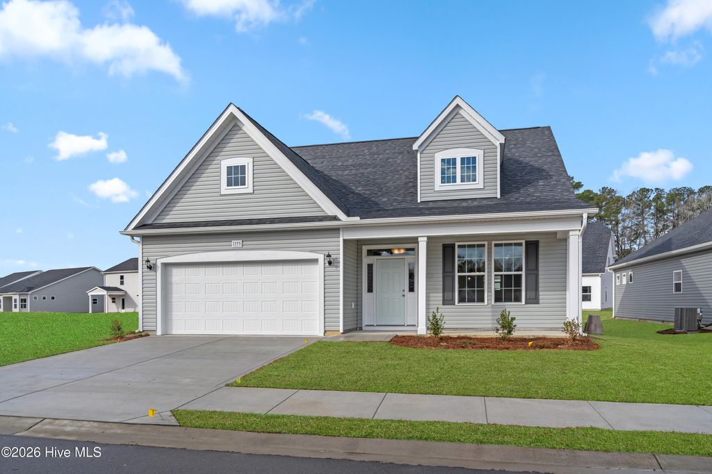 Photo of 1155 Forest Bend Drive NW, Carolina Shores, NC 28467 (MLS # 100549705)