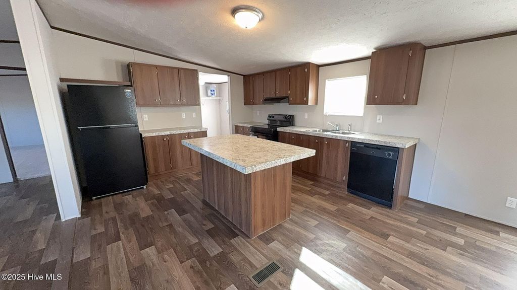 Photo of 5029 Heaths Glen Road, Wilson, NC 27893 (MLS # 100542235)