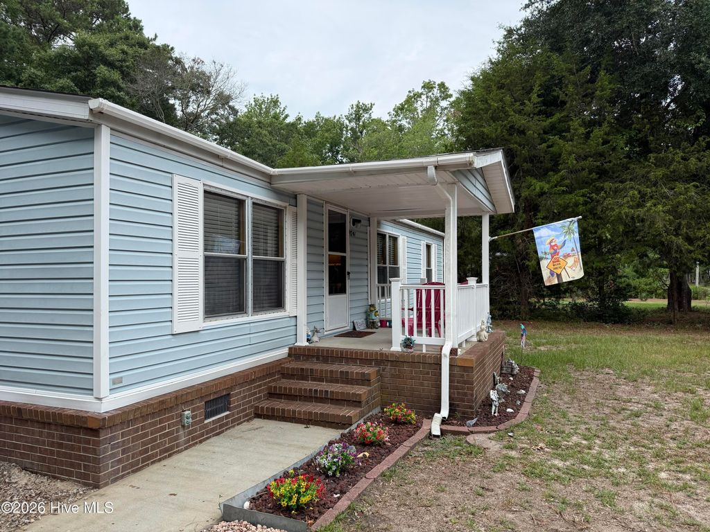 Photo of 9241 Heritage Drive SW, Calabash, NC 28467 (MLS # 100588492)