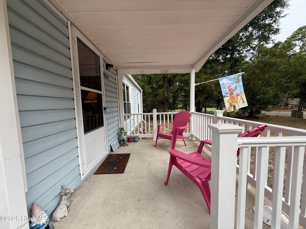 Photo of 9241 Heritage Drive SW, Calabash, NC 28467 (MLS # 100588492)