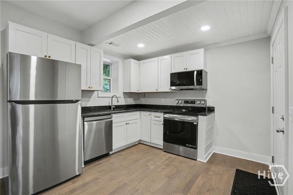 Photo of 121 W 61st Street, Savannah, GA 31405 (MLS # SA362640)