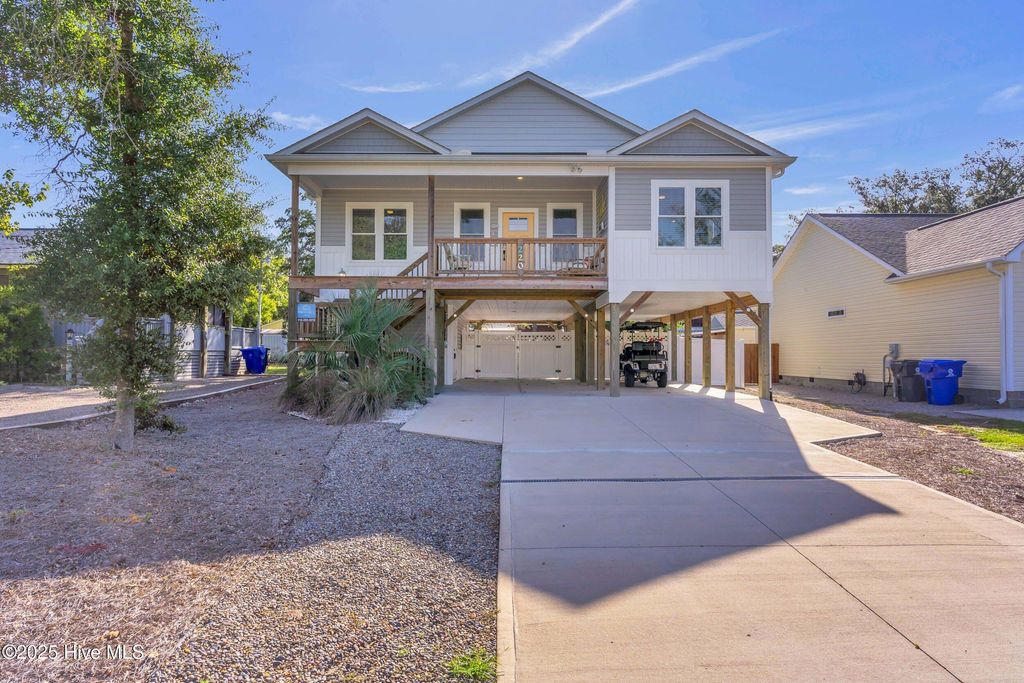 Photo of 220 NE 54th Street, Oak Island, NC 28465 (MLS # 100534529)