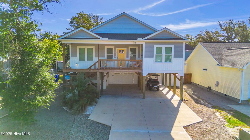 Photo of 220 NE 54th Street, Oak Island, NC 28465 (MLS # 100534529)
