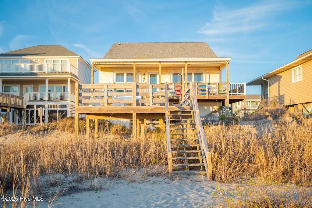 Photo of 1919 E Beach Drive, Oak Island, NC 28465 (MLS # 100562343)