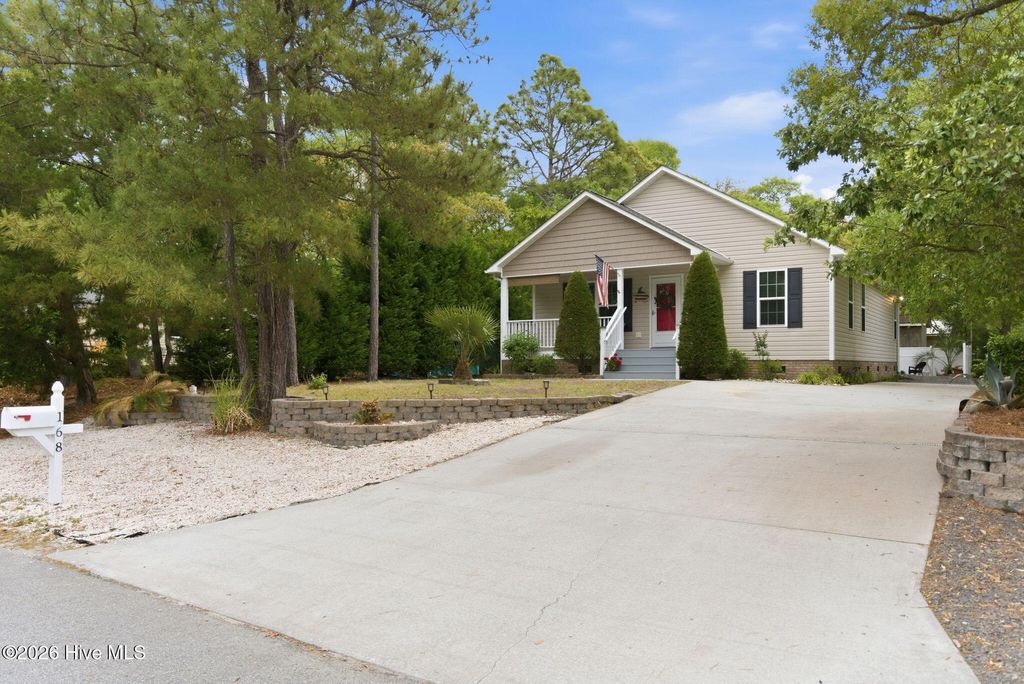 Photo of 168 NE 3rd Street, Oak Island, NC 28465 (MLS # 100570095)