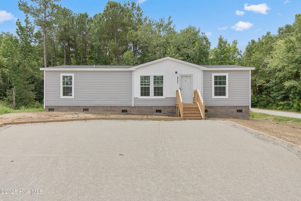 Photo of 6777 Lewis Drive SE, Winnabow, NC 28479 (MLS # 100542017)
