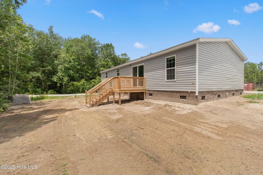 Photo of 6777 Lewis Drive SE, Winnabow, NC 28479 (MLS # 100542017)