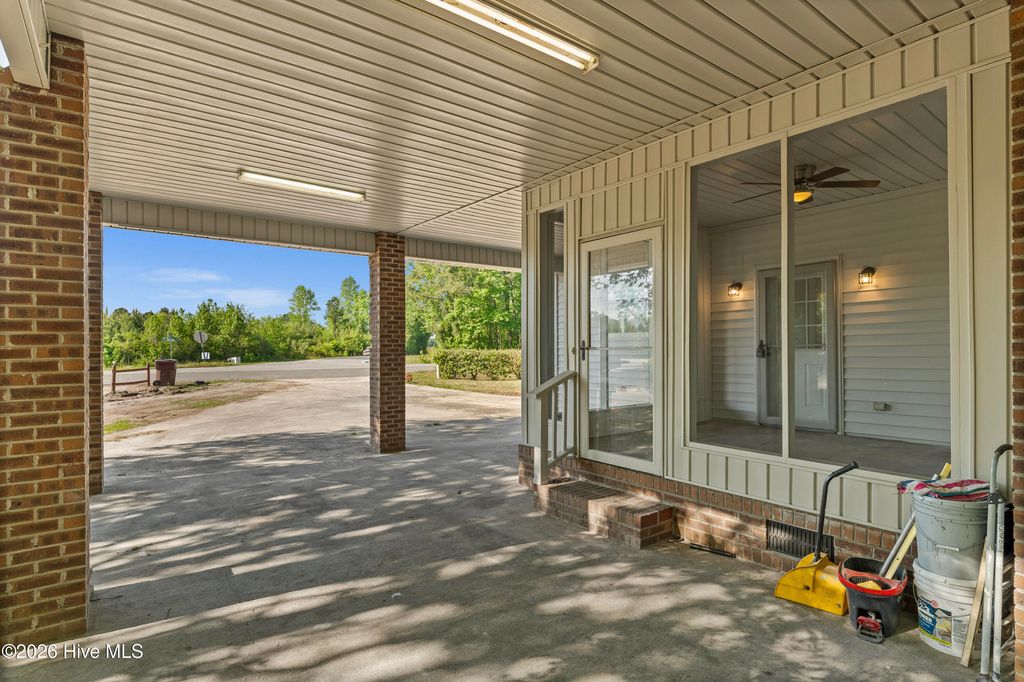 Photo of 11073 Sam Potts Highway, Lake Waccamaw, NC 28450 (MLS # 100569297)