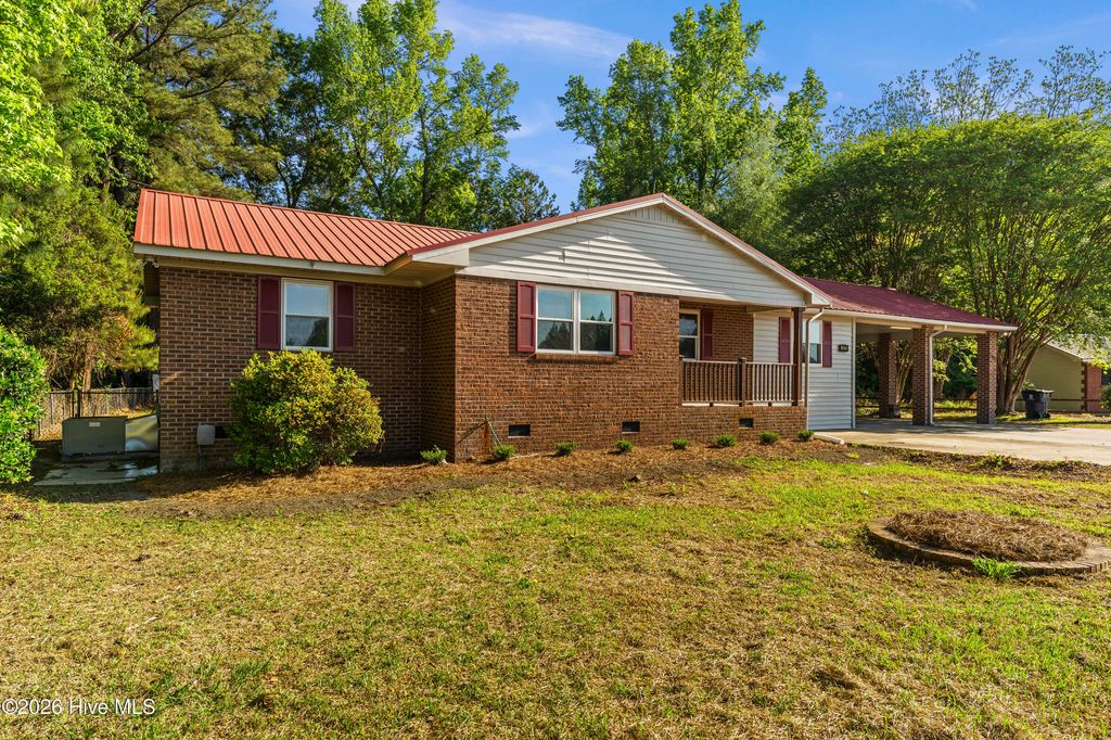 Photo of 11073 Sam Potts Highway, Lake Waccamaw, NC 28450 (MLS # 100569297)