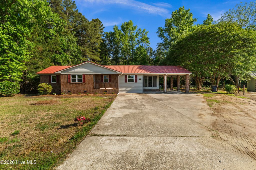 Photo of 11073 Sam Potts Highway, Lake Waccamaw, NC 28450 (MLS # 100569297)