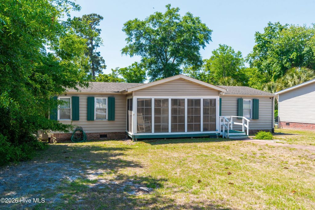 Photo of 628 Magnolia Drive, Sunset Beach, NC 28468 (MLS # 100571699)