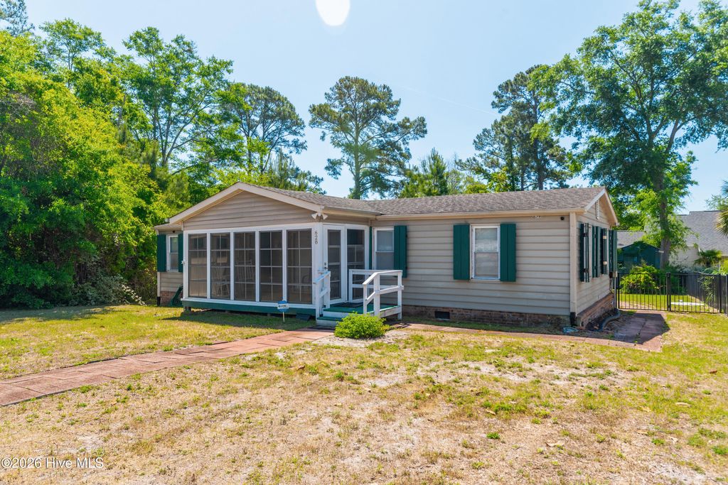 Photo of 628 Magnolia Drive, Sunset Beach, NC 28468 (MLS # 100571699)