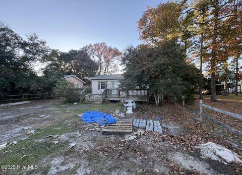 Tiny photo for 105 NE 67th Street, Oak Island, NC 28465 (MLS # 100544147)