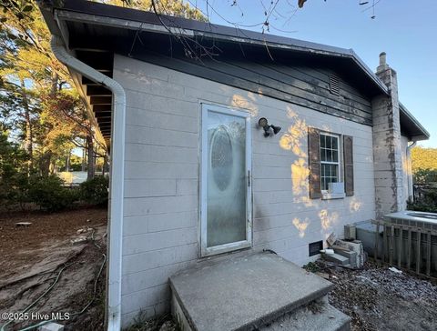 Tiny photo for 105 NE 67th Street, Oak Island, NC 28465 (MLS # 100544147)