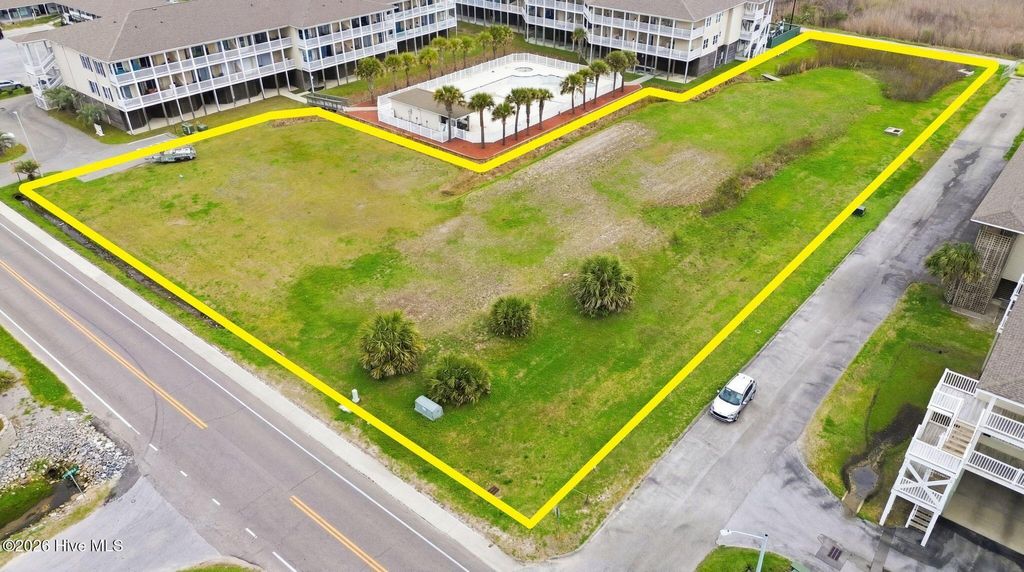 Photo of 120 SE 58th Street, Oak Island, NC 28465 (MLS # 100574137)