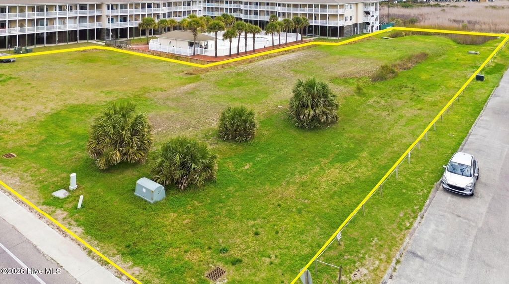 Photo of 120 SE 58th Street, Oak Island, NC 28465 (MLS # 100574137)