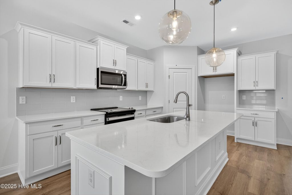 Photo of 5002 Coastal Plain Point #67, Leland, NC 28451 (MLS # 100544174)