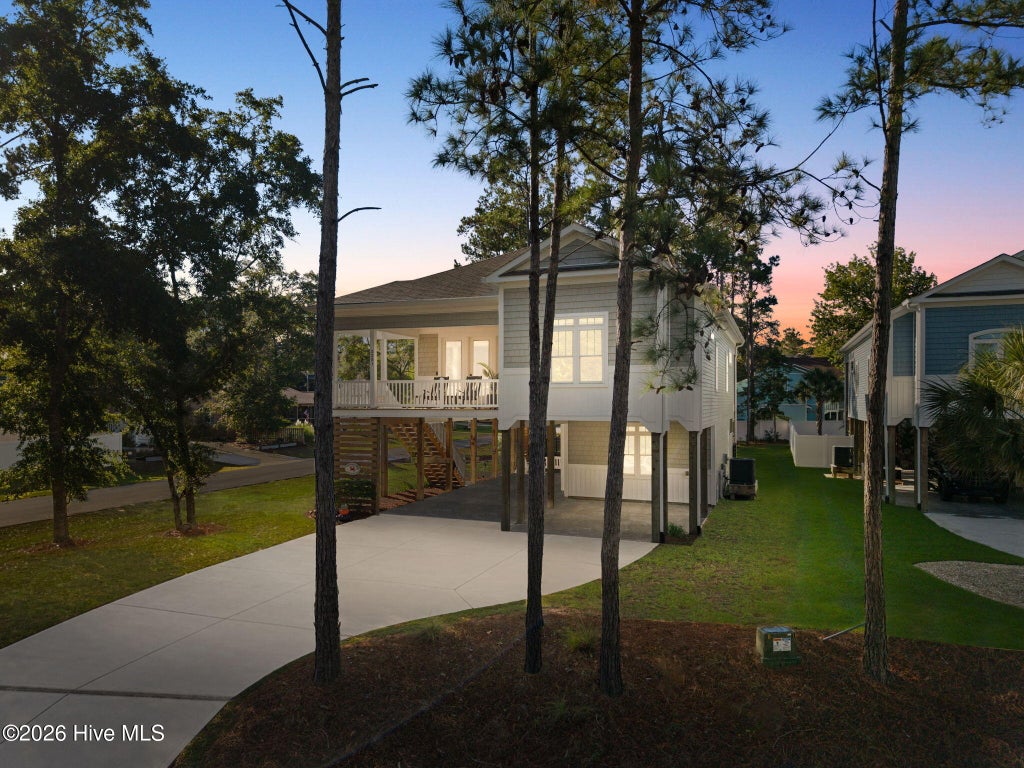 Photo of 2201 W Yacht Drive, Oak Island, NC 28465 (MLS # 100611035)