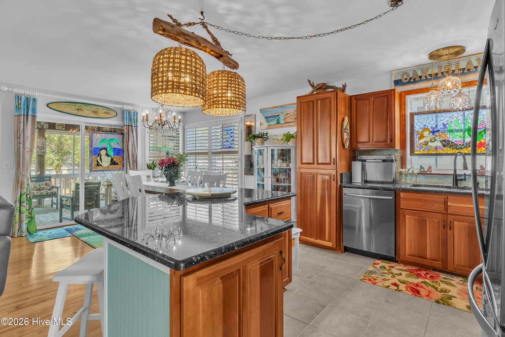 Photo of 204 NE 60th Street, Oak Island, NC 28465 (MLS # 100589568)
