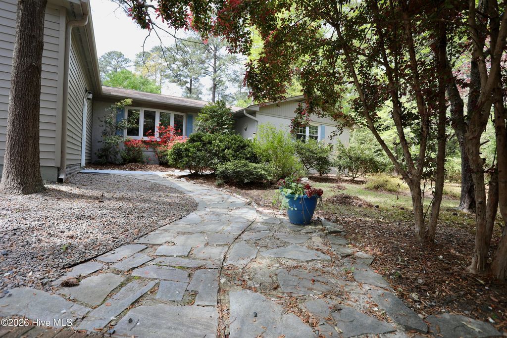 Photo of 107 S Lakeshore Drive, Whispering Pines, NC 28327 (MLS # 100566134)