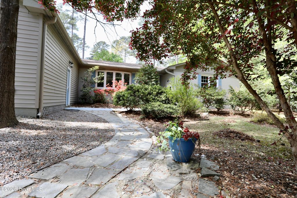 Photo of 107 S Lakeshore Drive, Whispering Pines, NC 28327 (MLS # 100566134)