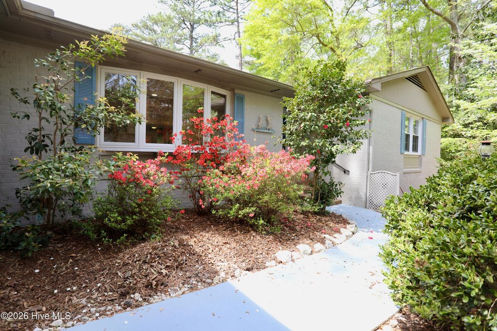 Photo of 107 S Lakeshore Drive, Whispering Pines, NC 28327 (MLS # 100566134)