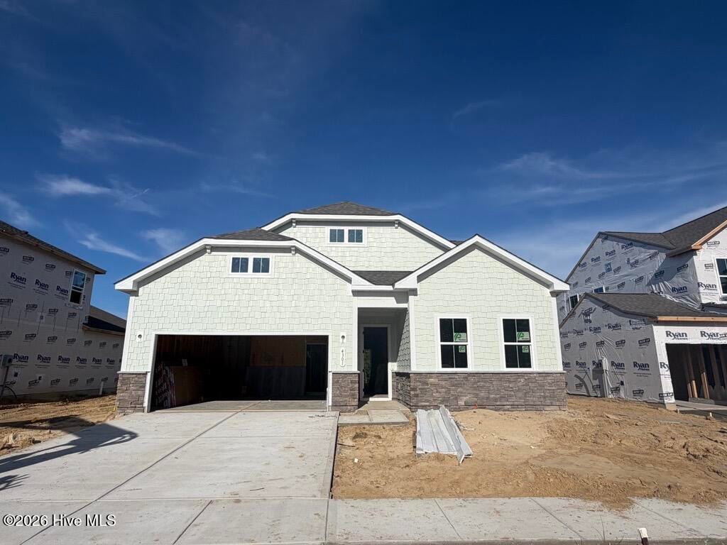 Photo of 4301 Farmfield Drive, Navassa, NC 28451 (MLS # 100606076)