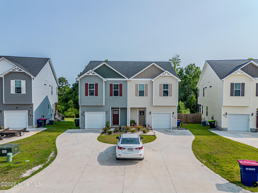 Photo of 409 Blockade Shoal Lane, Jacksonville, NC 28546 (MLS # 100591555)