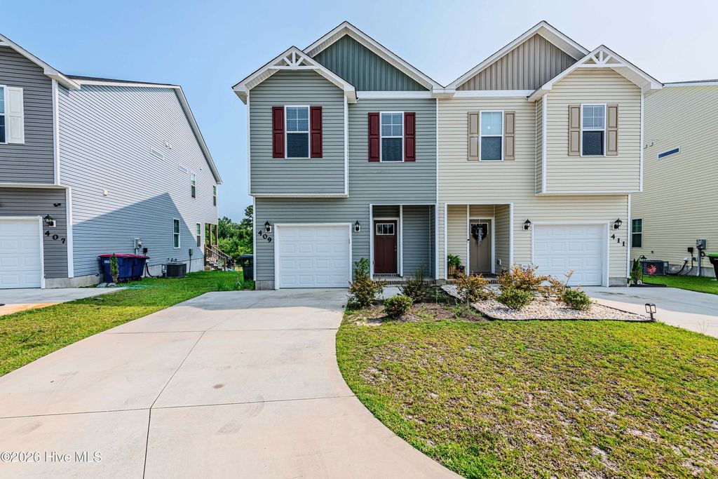 Photo of 409 Blockade Shoal Lane, Jacksonville, NC 28546 (MLS # 100591555)