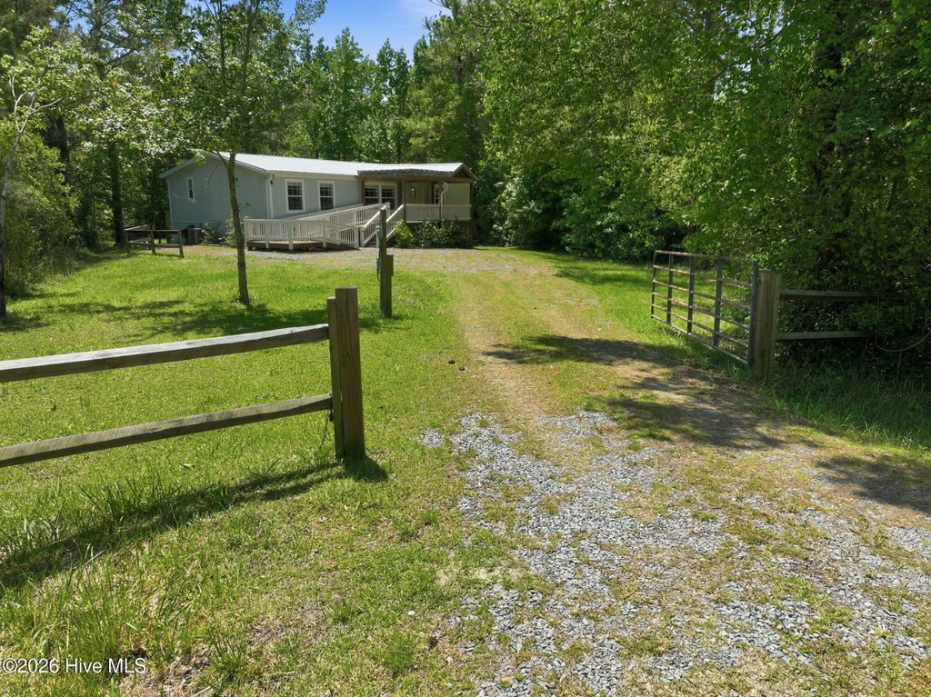 Photo of 217 Woodside Drive, Hampstead, NC 28443 (MLS # 100574171)