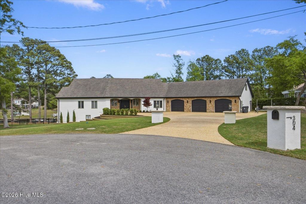 Photo of 304 Gull Road, Hampstead, NC 28443 (MLS # 100569224)