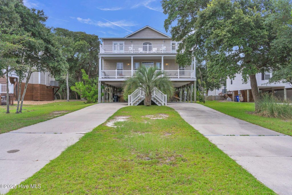 Photo of 114 SE 63rd Street, Oak Island, NC 28465 (MLS # 100522612)