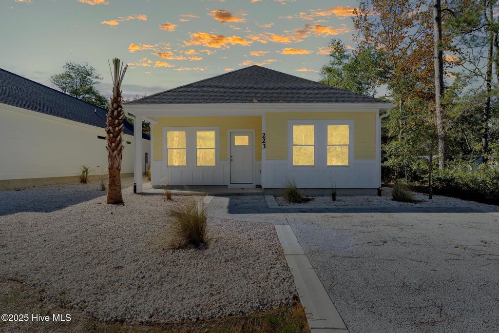 Photo of 223 NE 75th Street, Oak Island, NC 28465 (MLS # 100527494)