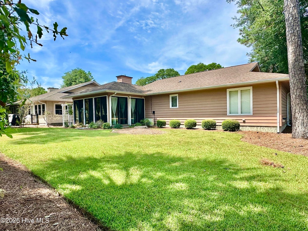 Photo of 515 Fairway Drive W, Sunset Beach, NC 28468 (MLS # 100599939)