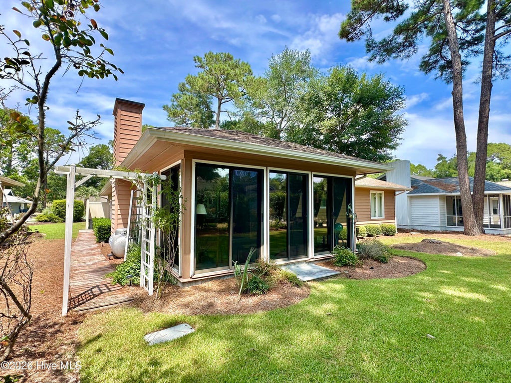Photo of 515 Fairway Drive W, Sunset Beach, NC 28468 (MLS # 100599939)