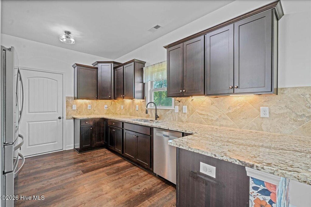Photo of 411 Planters Ridge Drive, Pikeville, NC 27863 (MLS # 100607470)