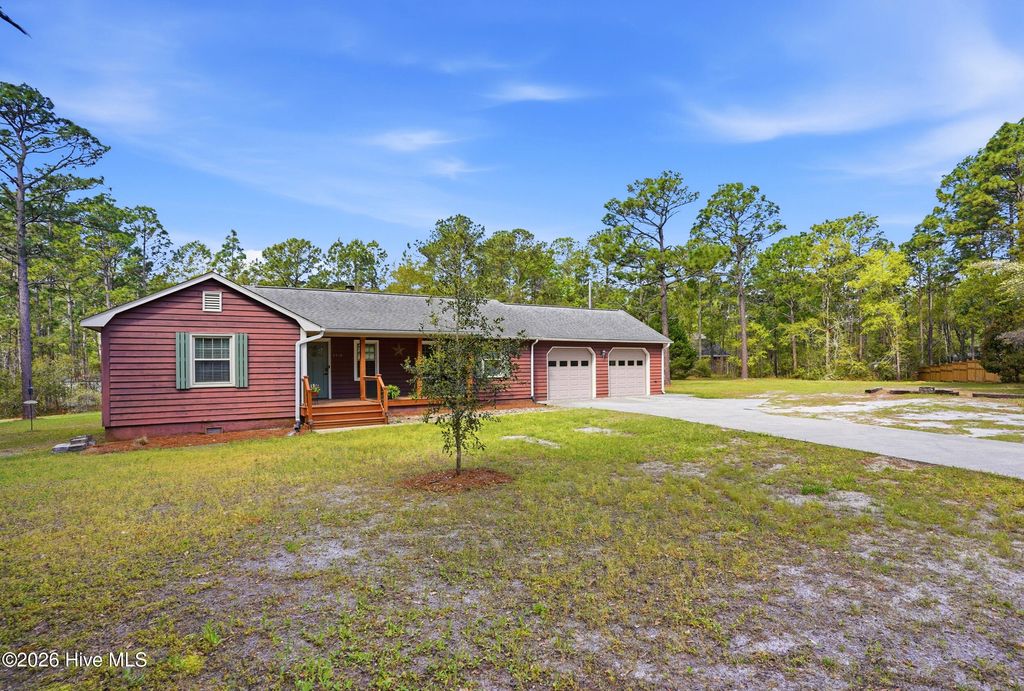 Photo of 9970 S Olde Towne Wynd SE, Belville, NC 28451 (MLS # 100565910)