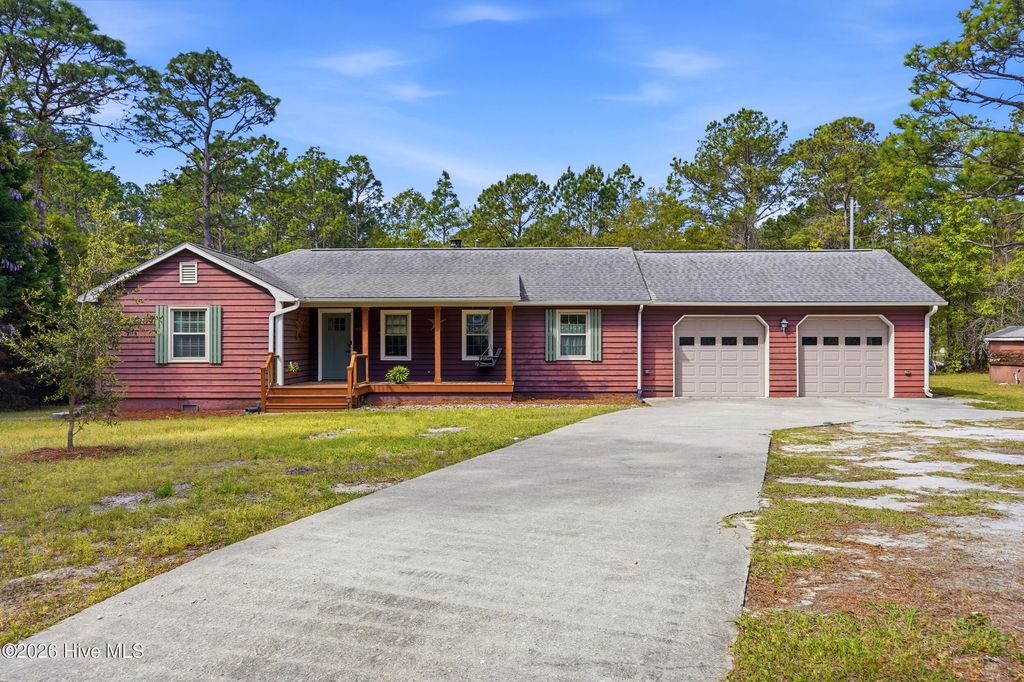 Photo of 9970 S Olde Towne Wynd SE, Belville, NC 28451 (MLS # 100565910)