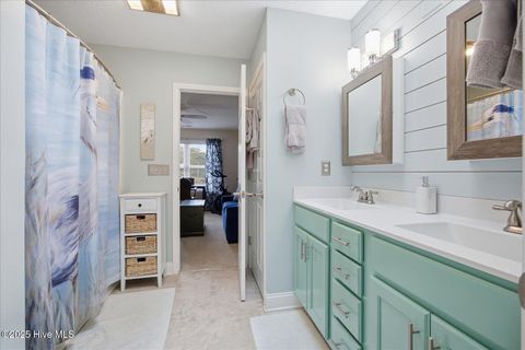 Tiny photo for 105 SE 17th Street, Oak Island, NC 28465 (MLS # 100546689)