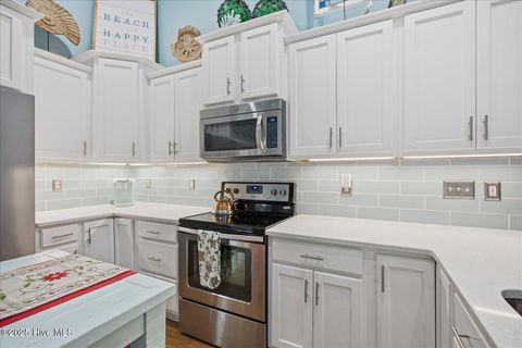 Tiny photo for 105 SE 17th Street, Oak Island, NC 28465 (MLS # 100546689)