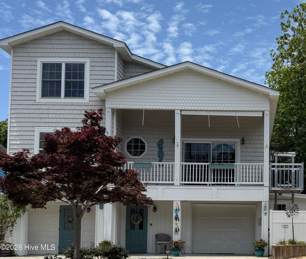 Photo of 105 SE 17th Street, Oak Island, NC 28465 (MLS # 100546689)