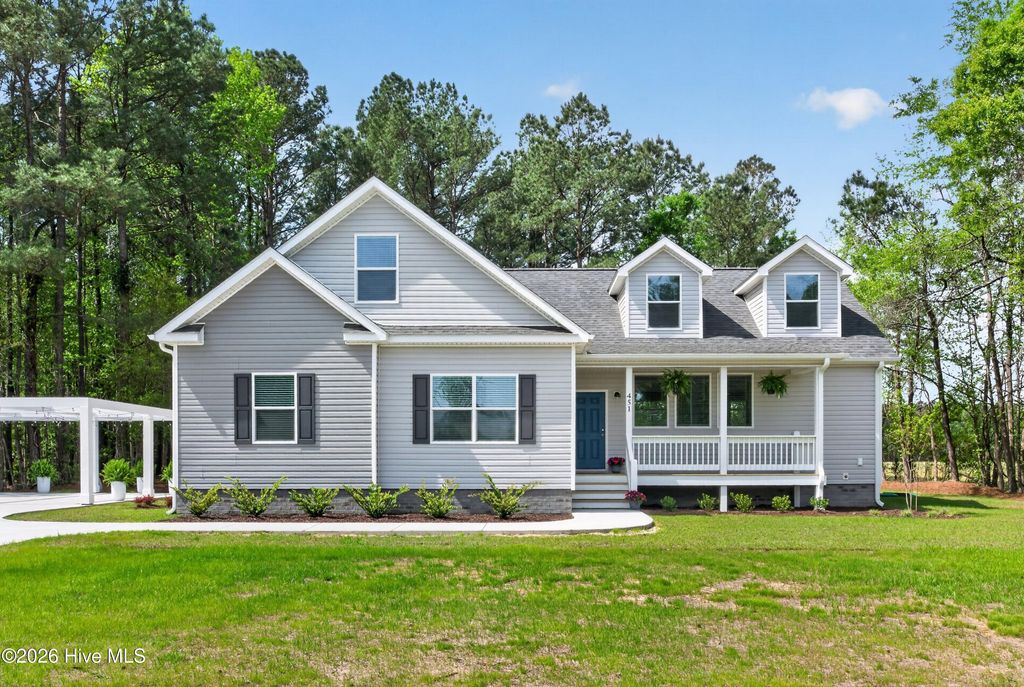 Photo of 451 Governors Road SE, Winnabow, NC 28479 (MLS # 100567047)